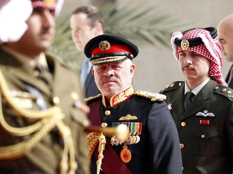 Jordan's King Abdullah II and Crown Prince Hussein (R) arrive for the opening session of the fourth ordinary parliamentary session in the capital Amman on November 10, 2019. (Khalil MAZRAAWI / AFP)