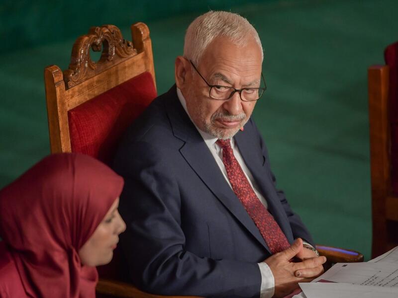 Tunisian Islamist-inspired Ennahdha party leader Rached Ghannouchi (R) chairs the first session of the new parliament following the October elections in the capital Tunis, on November 13, 2019. A collective oath by newly elected members of parliament was challenged by the leader of the Free Destourian Party (PDL), anti-Islamist lawyer Abir Moussi who wanted MPs to swear one by one, claiming some of them were not in the room at the time of the oath. It is the first clash on the floor of the Assembly between 