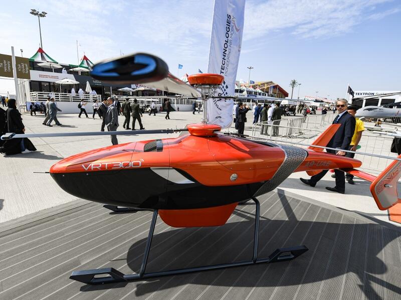 This picture taken on November 18, 2019 shows a view of a Russian Helicopters VRT 300 twin coaxial rotor unmanned helicopter on display during the 2019 Dubai Airshow. KARIM SAHIB / AFP