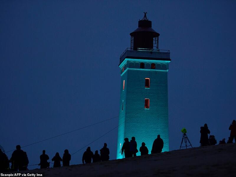 The Rubjerg Knude Lighthouse has now re-opened after the 120-year-old structure was moved 260ft away from the coastline. (AFP)