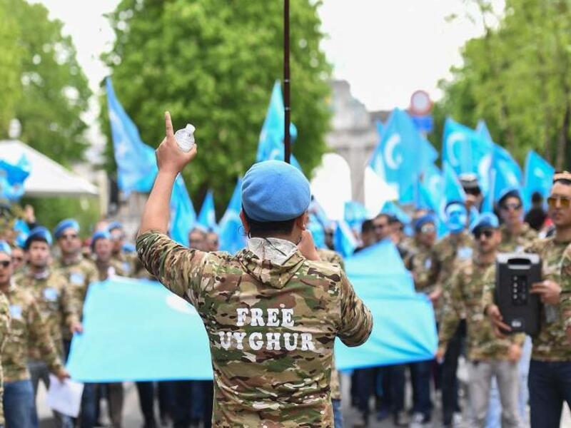 Ethnic Uyghurs take part in a protest march asking for the European Union to call upon China to respect human rights in the Chinese Xinjiang region and asking for the closure of "re-education centers." (AFP/ File Photo)