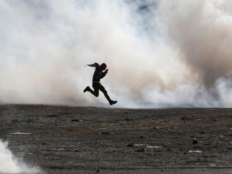 Palestinian demonstrators clash with Israeli security forces on November 26, 2019, in the West Bank city of Ramallah. (AFP/ File Photo)