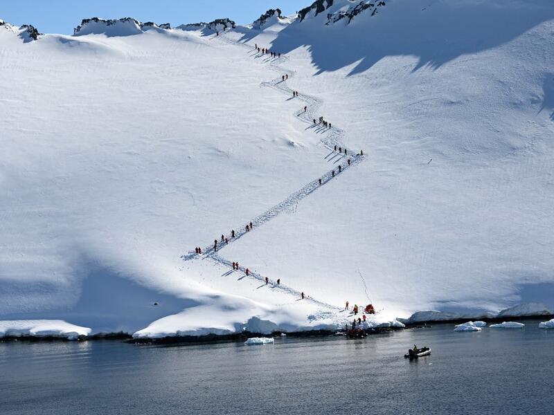 Tourists visit Orne Harbur in South Shetland Islands, Antarctica on November 08, 2019. Johan ORDONEZ / AFP