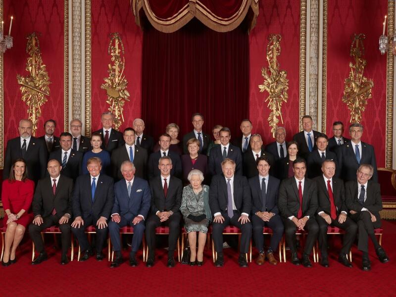 Leaders of Nato alliance countries, and its secretary general, join Queen Elizabeth II and the Prince of Wales for a group picture to mark 70 years of the alliance. Back row, from left: Xavier Bettel, Prime Minister of Luxembourg; Egils Levits, President of Latvia; Gitanas Nauseda, President of Lithuania; Dusko Markovic, Prime Minister of Montenegro; Erna Solberg, Prime Minister of Norway; Mark Rutte, Prime Minister of Netherlands; Zuzana Caputova, President of Slovakia; Andrzej Duda, President of Poland; A