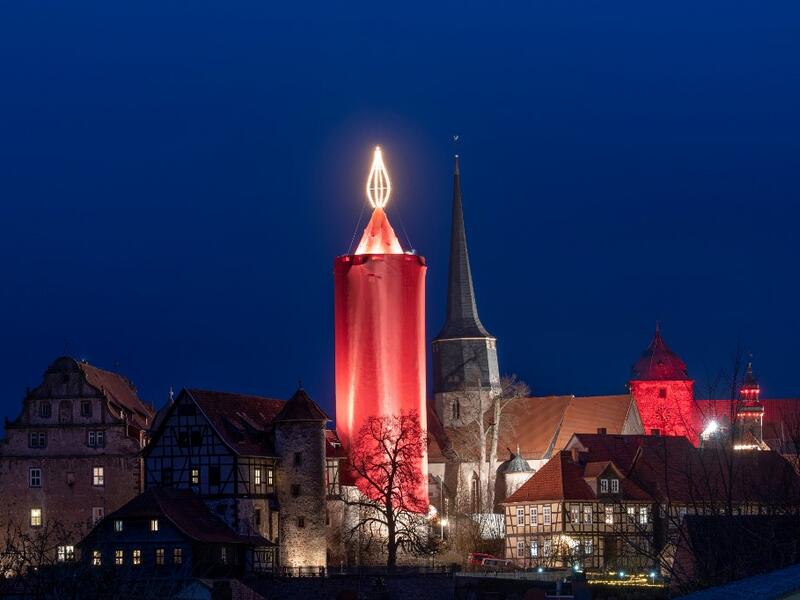 A picture taken on December 7, 2019 shows a tower made up as a giant candle in Schlitz, central Germany, as part of the Christmas celebrations. Boris Roessler / dpa / AFP