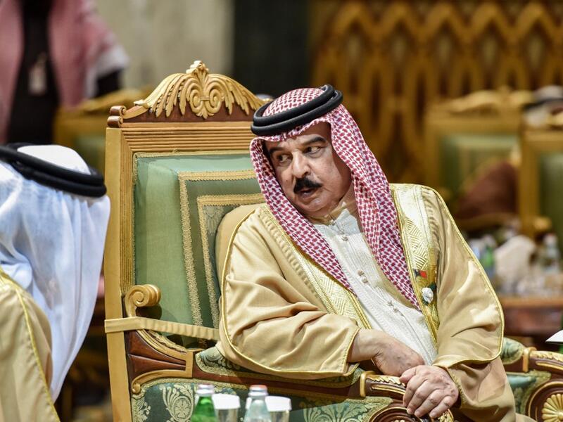 King Hamad bin Isa Al Khalifa of Bahrain, speaks with another delegate during the 40th Gulf Cooperation Council (GCC) summit held at the Saudi capital Riyadh on December 10, 2019. Fayez Nureldine / AFP