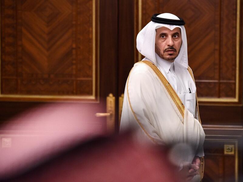 Abdullah bin Nasser bin Khalifa al-Thani, Qatar's Prime Minister, is seen waiting for a family picture during the 40th Gulf Cooperation Council (GCC) summit held at the Saudi capital Riyadh on December 10, 2019. Fayez Nureldine / AFP