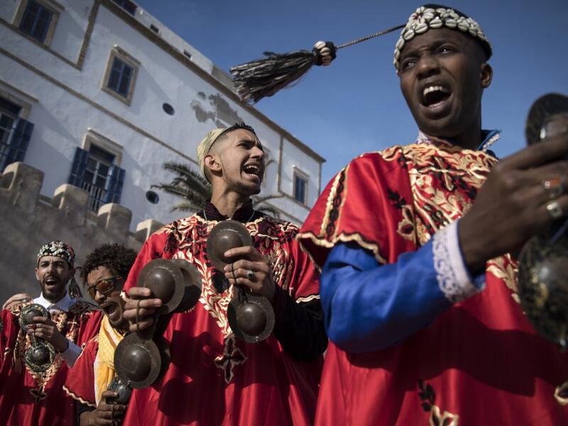 African rituals and Sufi traditions, was added to UNESCO's list of Intangible Cultural Heritage of Humanity earlier in the week. Gnawa refers to a "set of musical productions, fraternal practices and therapeutic rituals where the secular mixes with the sacred", according to the nomination submitted by Morocco. Often dressed in colourful outfits, Gnawa musicians play the guenbri, a type of lute with three strings, accompanied by steel castanets called krakebs. FADEL SENNA / AFP