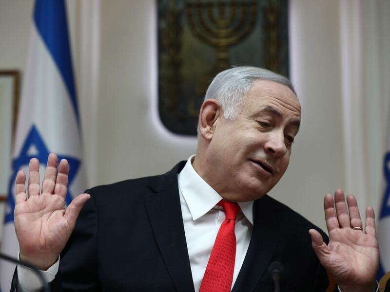 Israeli Prime Minister Benjamin Netanyahu chairs the weekly cabinet meeting at his Jerusalem office on December 15, 2019. GALI TIBBON / POOL / AFP
