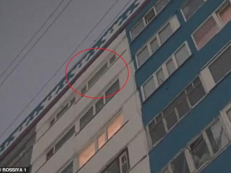Window from where a schoolgirl, 7, fell in the town of Novy Urengoy in north-central Russia. (ROSSYIA1)