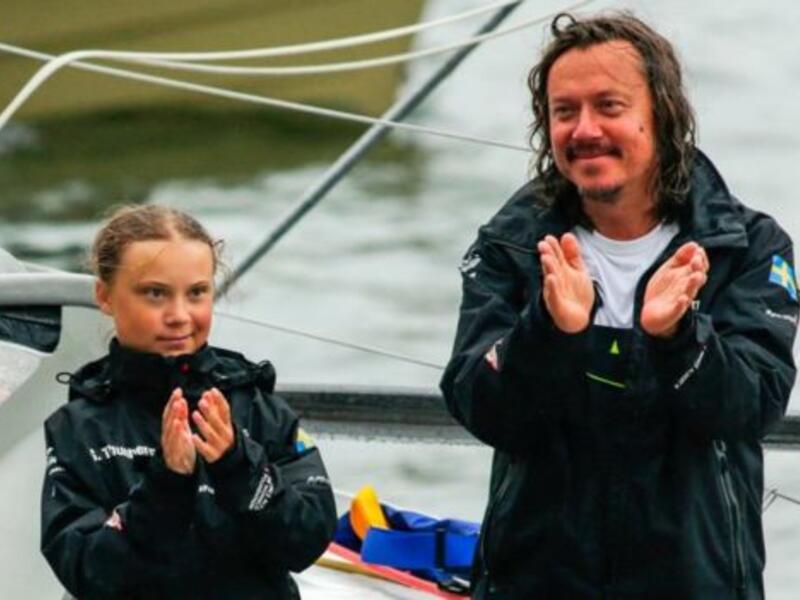 Svante Thunberg, father of climate activist Greta Thunberg, pictured together on a zero-carbon yacht in New York in August has given a rare interview about his daughter where he denied being the driving force behind her campaign and said her activism had helped her beat depression (AFP)