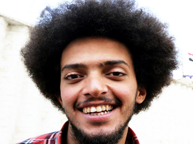 An Iraqi anti-government protestor poses with a distinct hairstyle at Tahrir Square in central Baghdad on December 23, 2019. Since the start of Iraq's anti-government protests on October 1, one thing strikes the eye perhaps above all else -- the unbridled hairstyles young men sport. High quiffs, tight fades and loads of attitude -- it is quite the male beauty pageant. SABAH ARAR / AFP