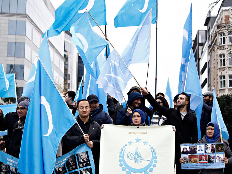 Activists protest the treatment of Uyghur Muslims by Chinese authorities in Xinjiang province. (Shutterstock/ File Photo)