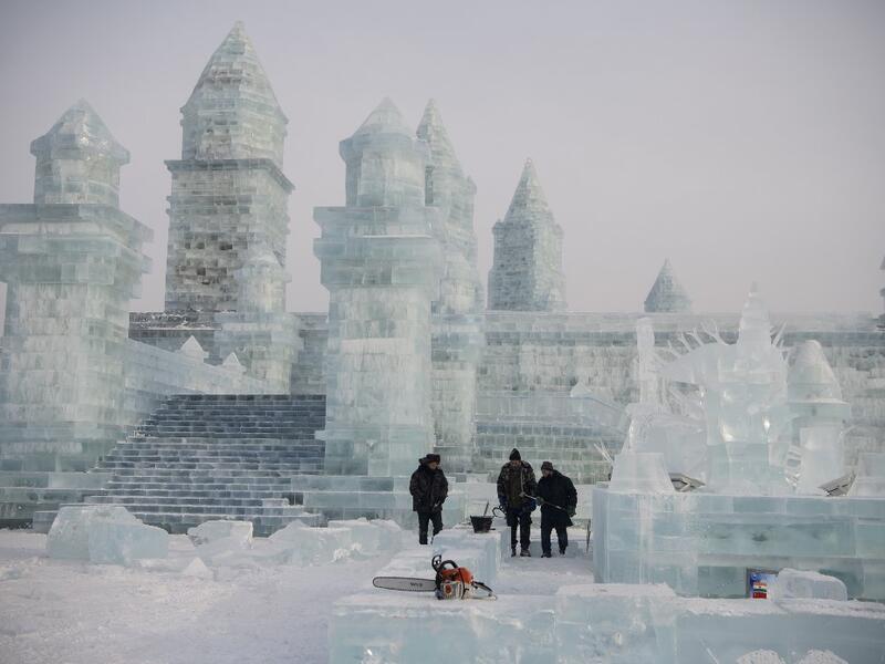 China's annual ice festival in Harbin has kicked off late on January 5 with couples lining up for a snow-themed mass wedding, swimmers braving frigid waters and frozen palaces rising from the ground. NOEL CELIS / AFP