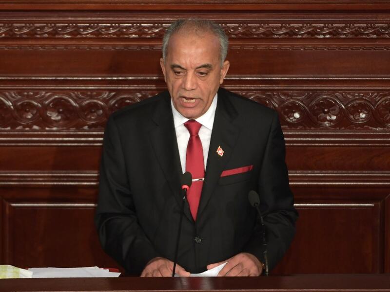 Tunisia's Prime Minister-designate Habib Jemli addresses parliamentarians during a plenary session in the capital Tunis, on January 10, 2020, for a confidence vote on his proposed cabinet line-up. Jemli unveiled on January 2, a proposed government composed of independent figures, after months of negotiations between political parties to fill positions failed. The cabinet of 28 ministers, most of whom are unknown to the general public, including four women, needs to receive parliamentary assent. FETHI BELAID