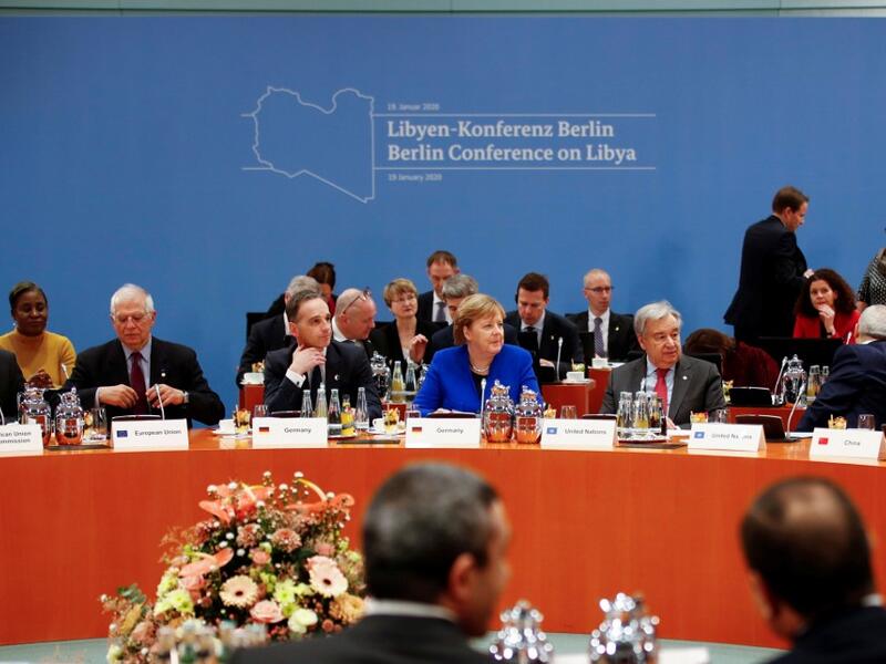 German Chancellor Angela Merkel (4thL) is flanked by German Foreign Minister Heiko Maas (3rdL) and Secretary-General of the United Nations (UN) Antonio Guterres (2ndR) as African Union (AU) Committee Chairman Moussa Faki (L) and European Union High Representative for Foreign Affairs and Security Policy Josep Borrell (2ndL) look on at the start of a Peace summit on Libya at the Chancellery in Berlin, on January 19, 2020. World leaders gather in Berlin on January 19, 2020. HANNIBAL HANSCHKE / POOL / AFP