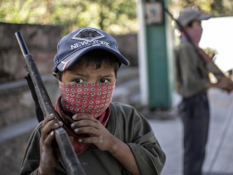 The CRAC-PF vigilante group trains children as young as five so they can protect themselves from drug-related criminal groups operating in the area. Pedro PARDO / AFP