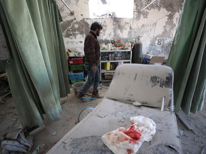 A Syrian man inspects damages in Al-Iman hospital following a reported Russian air strike in the town of Sarjah, northwest of Maaret al-Numan in the northwestern Syrian province of Idlib, on January 26, 2020.(AFP/ File Photo)