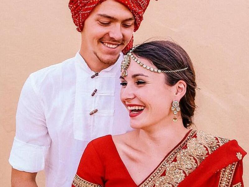 The couple, who have been together since 2013, said they put their plans  for a family on hold in order to travel (pictured in India)  (Dailymail/ Ella Geiger)