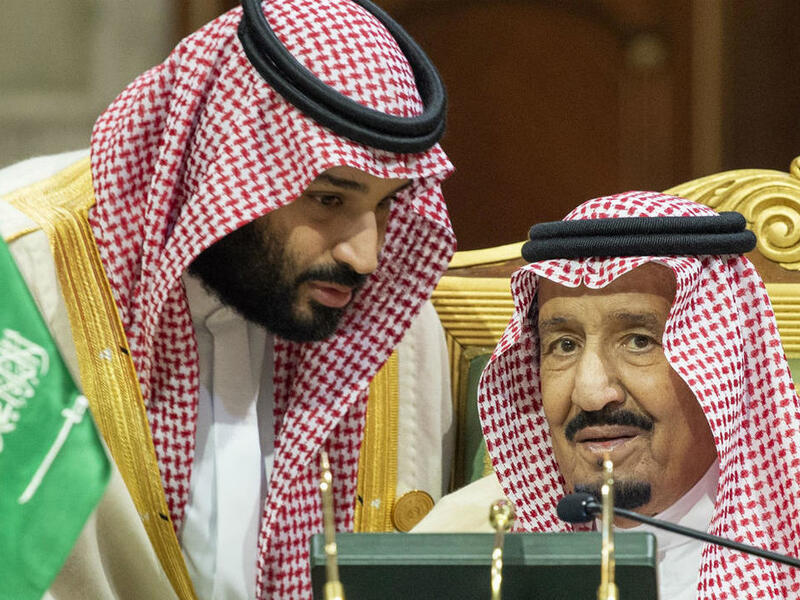 King Salman's reshuffle leaves untouched the authority of Crown Prince Mohammed bin Salman (left). (AFP/ File Photo)