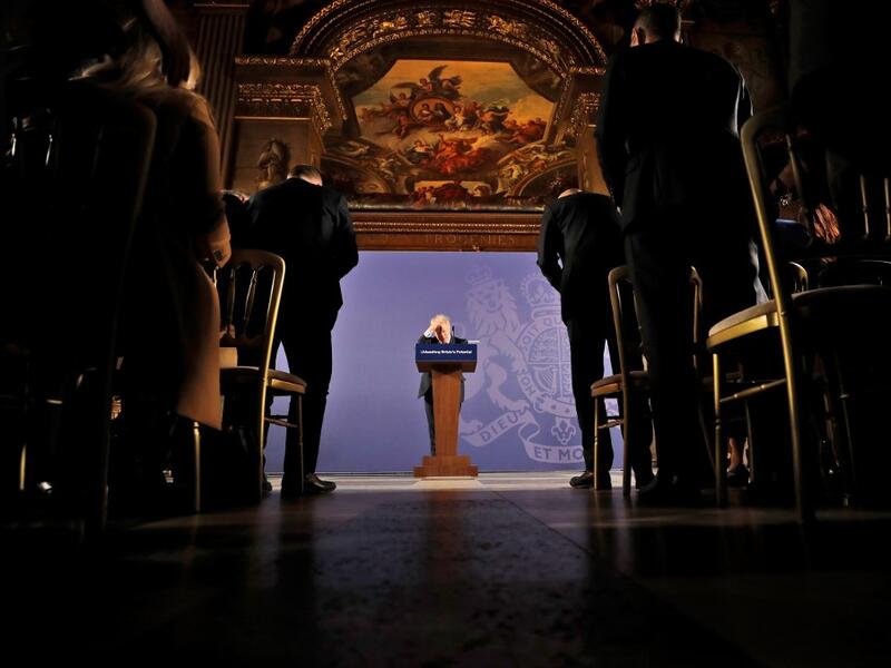 Britain's Prime Minister Boris Johnson reacts as he delivers a speech at the Old Royal Naval College in Greenwich, south east London on February 3, 2020. Britain on Monday said it wanted a "thriving trade and economic relationship" with the European Union, as it set out its position for future trade talks after it left the bloc. But Prime Minister Boris Johnson pledged: "We will not engage in some cut-throat race to the bottom. We are not leaving the EU to undermine European standards. We will not engage in