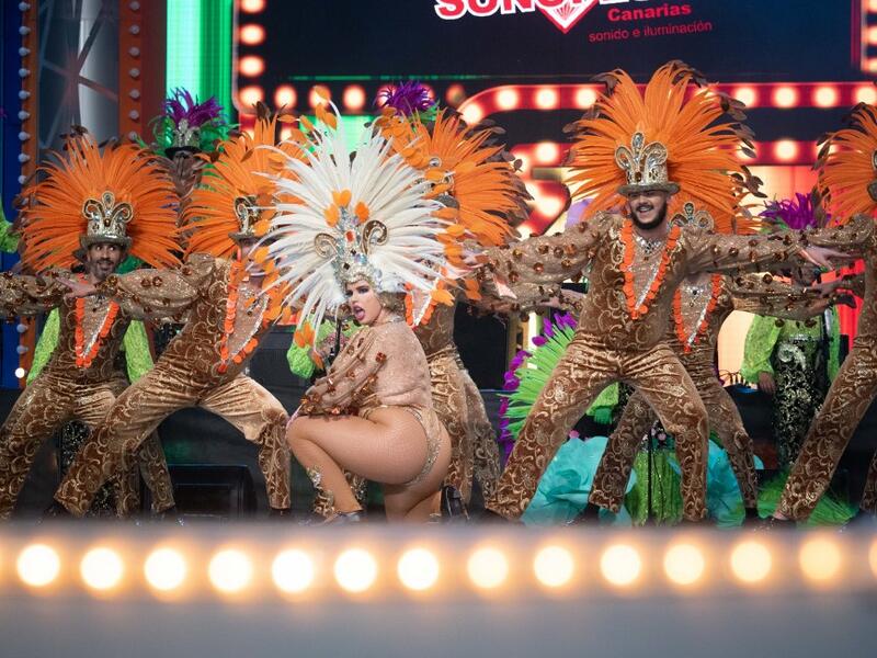 Dancers perform on the main stage in the Battle of the Troops contest during carnival celebrations in Santa Cruz de Tenerife, on the Spanish Canary island of Tenerife, on February 15, 2020. The event begins on January 24 and finishes on March 1 with orchestras playing Caribbean and Brazilian rhythms throughout the festivities that range from the election for the Carnival Queen, the Junior Queen and the Senior Queen, children and adult murgas (satirical street bands), comparsas (dance groups) to performances