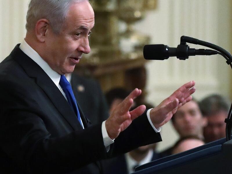 WASHINGTON, DC - JANUARY 28: Israeli Prime Minister Benjamin Netanyahu speaks during a press conference with U.S. President Donald Trump in the East Room of the White House on January 28, 2020 in Washington, DC. President Trump is expected to release details of his administration's long-awaited Middle East peace plan to resolve the Israeli-Palestinian conflict. Alex Wong/Getty Images/AFP ALEX WONG / GETTY IMAGES NORTH AMERICA / AFP
