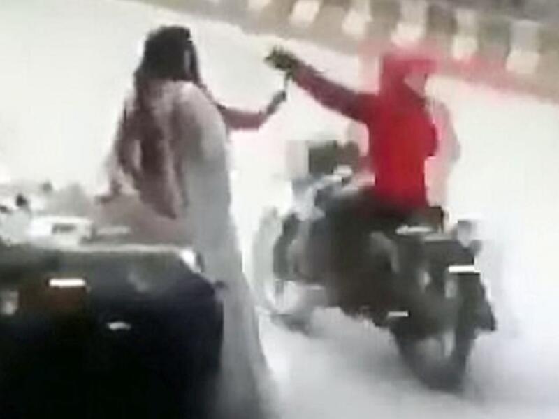 The stunned women look around in confusion as one raises her hand to her mouth before members of staff jog out to help them. (Video Screenshot)