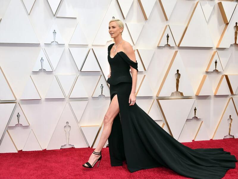 Charlize Theron wears chic custom made Dior gown