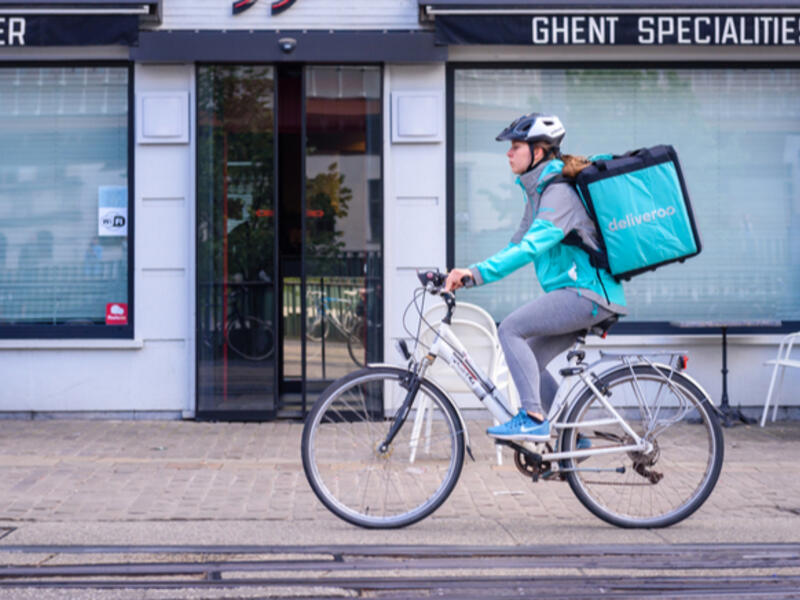 Deliveroo is food delivery company. Couriers transport orders from restaurants to customers. (Shutterstock)