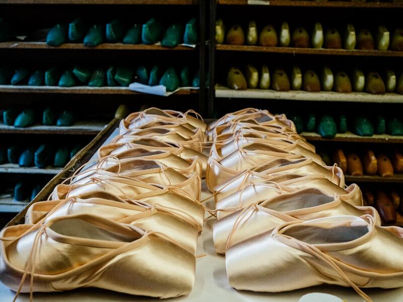 A picture taken at Grishko company shows pointe shoes in the company's Moscow workshop on February 25, 2020. Born in the chaos of the collapse of the Soviet Union, the Grishko family business has emerged among the top makers in the world of dance shoes, notably classic ballet pointe shoes, worn on the world's great stages. Dimitar DILKOFF / AFP