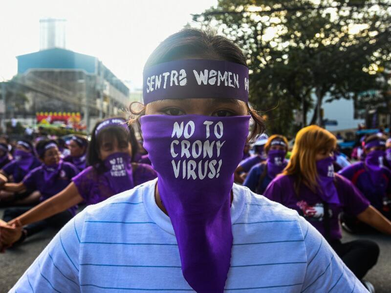 Filipino women hold a protest rally during the celebration of International Women's Day in Manila on March 8 2020. Maria TAN / AFP