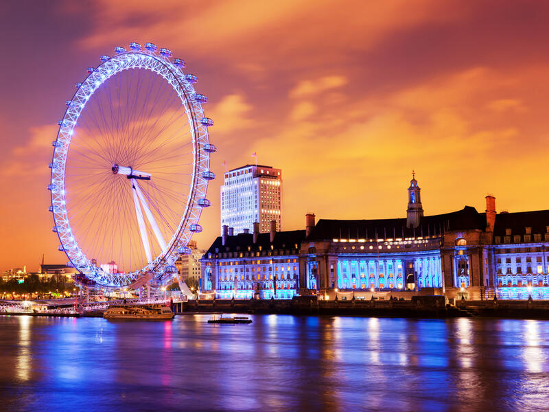 London, England the UK skyline in the evening. Ilumination of the London Eye and the buildings next to River Thames.(Shutterstock/ File Photo)