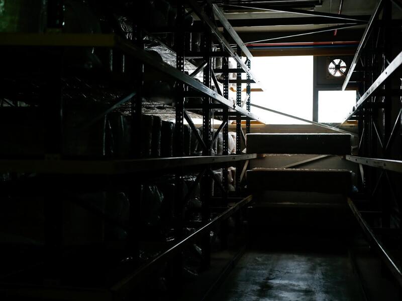Coffins are stacked at the Eurocoffin coffins factory in Barcelona on April 3, 2020. More than 900 people died in Spain over the past 24 hours for the second day running, government figures showed, although the rate of new infections and deaths continued to slow. Spain has the world's second-highest death toll after Italy with the virus so far claiming 10,935 lives from 117,710 confirmed cases.  PAU BARRENA / AFP