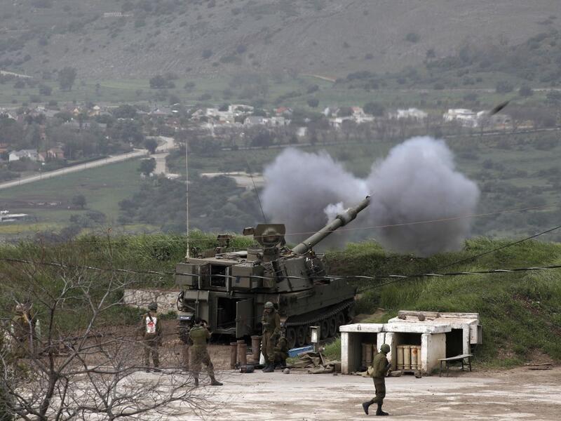Israeli soldiers take part in a mobile artillery exercise near the border with Syria in the Israeli-occupied Golan Heights on April 5, 2020. JALAA MAREY / AFP