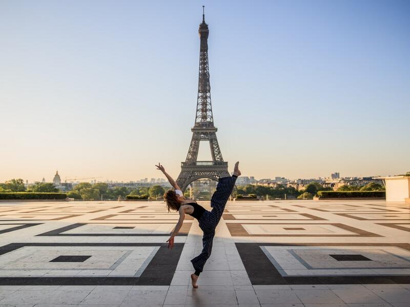 Syrian dancer and choreographer Yara al-Hasbani performs a dance on the empty Trocadero square in front of the Eiffel tower in Paris on April 22, 2020, on the 37th day of a strict lockdown in France to stop the spread of COVID-19 (novel coronavirus). Yara al-Hasbani was putting the finishing touches to her make-up for a performance of "Romeo and Juliet" in Damascus when she found out her father had been tortured to death. Sameer Al-DOUMY / AFP