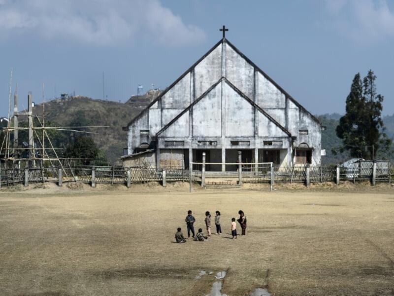 This photo taken on February 8, 2020 shows a general view of Longwa village in Myanmar's Sagaing region, near the border with India. The king of the Konyak tribe sleeps in Myanmar, but eats in India -- his house, village and people divided by a mountain border which serves as a vulnerable lifeline now severed by a coronavirus lockdown.  Ye Aung THU / AFP
