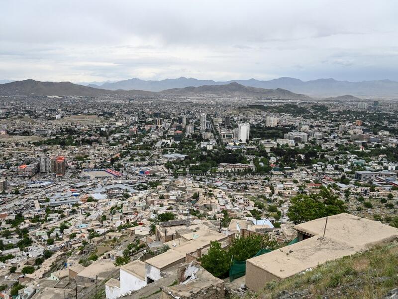 A general view shows the city from the top of a hillside, in Kabul on May 17, 2020. WAKIL KOHSAR / AFP