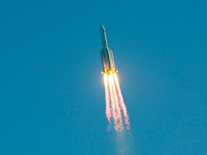 The Long March 5B rocket is pictured taking off from the the Wenchang launch site on China's southern Hainan island on May 5. It spent a few days in orbit before splashing down off West Africa (AFP)