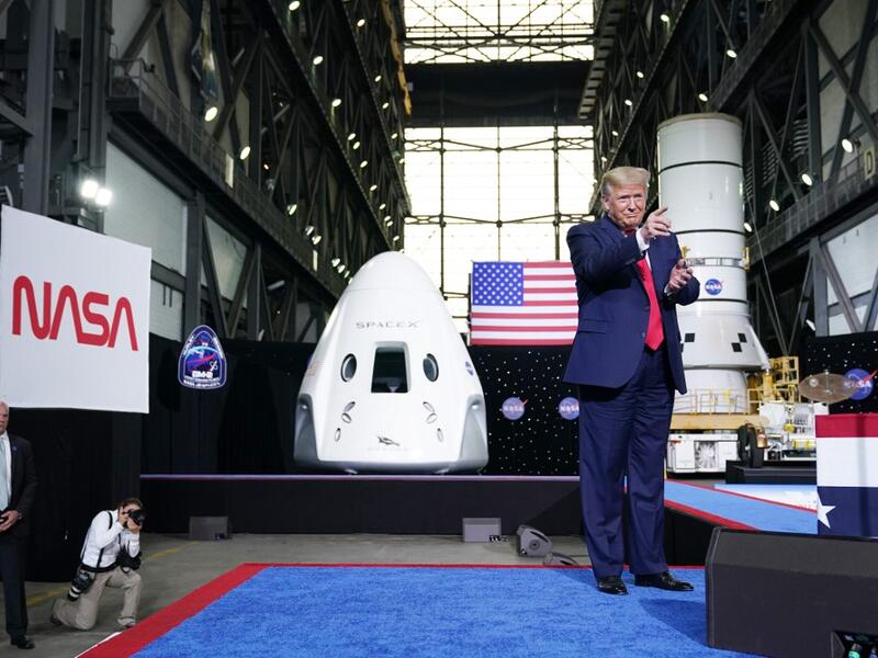 US President Donald Trump arrives to speak after the launch of the SpaceX Falcon 9 rocket and Crew Dragon spacecraft on NASA's SpaceX Demo-2 mission to the International Space Station from NASA's Kennedy Space Center in Cape Canaveral, Florida on May 30, 2020. Trump travels to Kennedy Space Center in Florida to watch the launch of the MANDEL NGAN / AFP