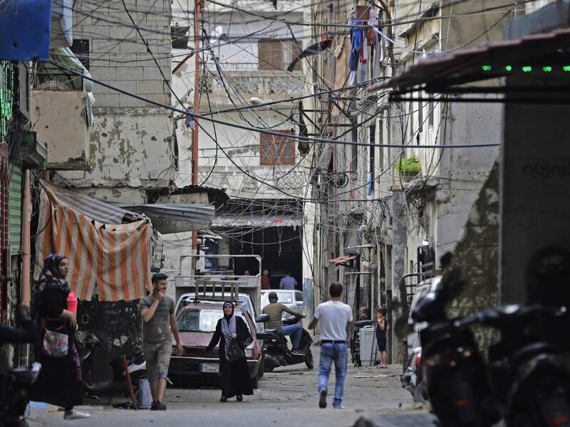This picture taken on June 3, 2020 shows a view of an alley in the Bab al-Tabbaneh neighbourhood of Lebanon's northern city of Tripoli. Thousands of residents of Lebanon's northern Tripoli struggle to put food on the table, as the country's worst economic crisis in decades has picked up in speed in recent weeks, with food prices rising by more than 70 percent since the autumn. Inflation has been a blow in the country where more than 45 percent of the country's population now lives below the poverty line, an