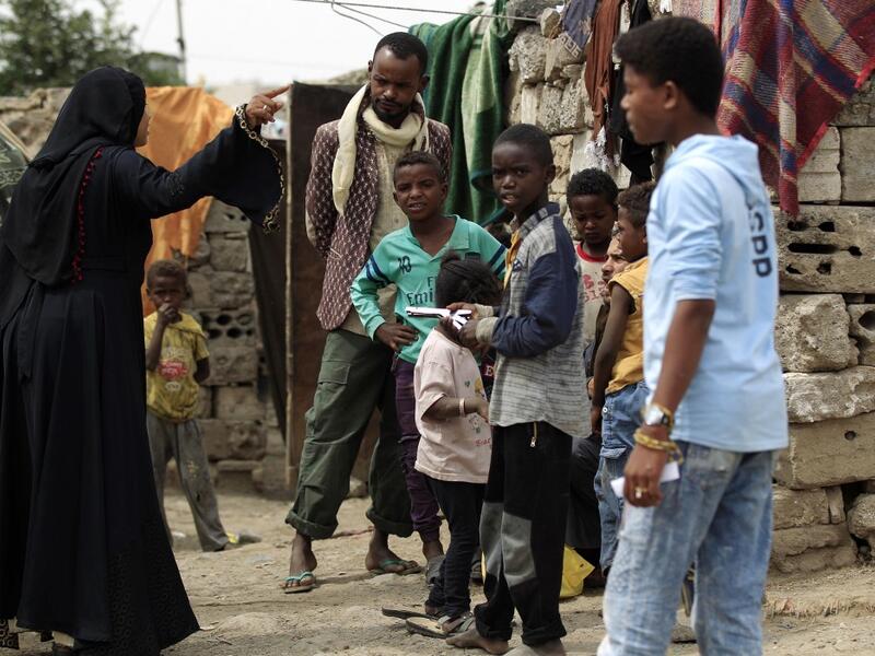 Members of Yemen's minority group known as "Muhamasheen" -- literally the "Marginalised" are pictured at a slum in the capital Sanaa on July 4, 2020. At a time when the Black Lives Matter movement is reshaping societies, black Yemenis have scant hope for an end to centuries of discrimination that has only worsened during the civil war. In Sanaa, members of the minority group known as "Muhamasheen" live in dismal conditions in densely populated slums. They count among the poorest of the poor in the Arab worl