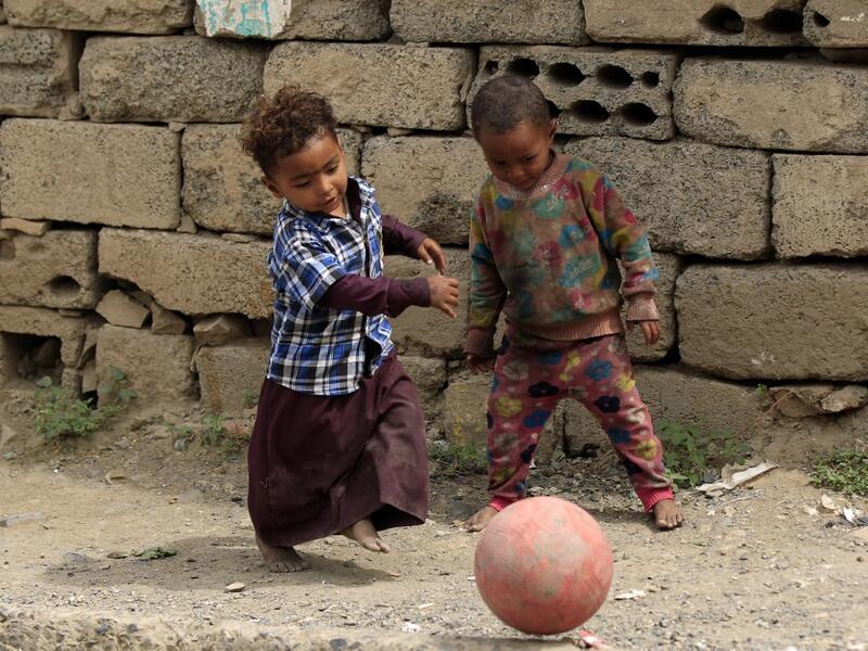 Children of Yemen's minority group known as "Muhamasheen" -- literally the "Marginalised" are pictured at a slum in the capital Sanaa on July 4, 2020. At a time when the Black Lives Matter movement is reshaping societies, black Yemenis have scant hope for an end to centuries of discrimination that has only worsened during the civil war. In Sanaa, members of the minority group known as "Muhamasheen" live in dismal conditions in densely populated slums. They count among the poorest of the poor in the Arab wor