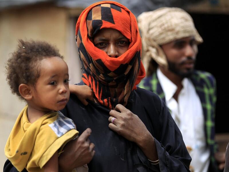 Members of Yemen's minority group known as "Muhamasheen" -- literally the "Marginalised" are pictured at a slum in the capital Sanaa on July 4, 2020. At a time when the Black Lives Matter movement is reshaping societies, black Yemenis have scant hope for an end to centuries of discrimination that has only worsened during the civil war. In Sanaa, members of the minority group known as "Muhamasheen" live in dismal conditions in densely populated slums. They count among the poorest of the poor in the Arab worl