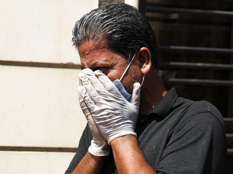 A mourner cries during the funeral of slain Iraqi jihadism expert Hisham al-Hashemi, who was shot dead yesterday outside his house in the Iraqi capital, in Baghdad’s Zayouna district on July 7, 2020. Hashemi was an authoritative voice on Sunni jihadist factions including the Islamic State group, but was also frequently consulted by media and foreign governments on domestic Iraqi politics and Shiite armed groups. He had warm ties with top decision-makers, including President Barham Saleh.