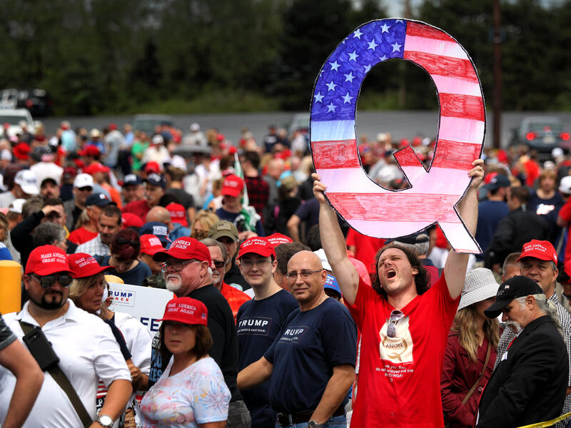 Is QAnon Creeping Into US Congress and Police? Twitter Crackdown Highlights Group's Spread and Popularity
