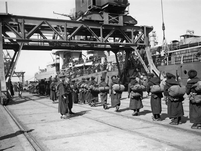 Moroccan goumiers (indigenous Moroccan soldiers who served in the French Army) parade on the docks, in October 1945, after disembarking the the French Navy light cruiser Duguay-Trouin in the port of Tangiers. AFP
