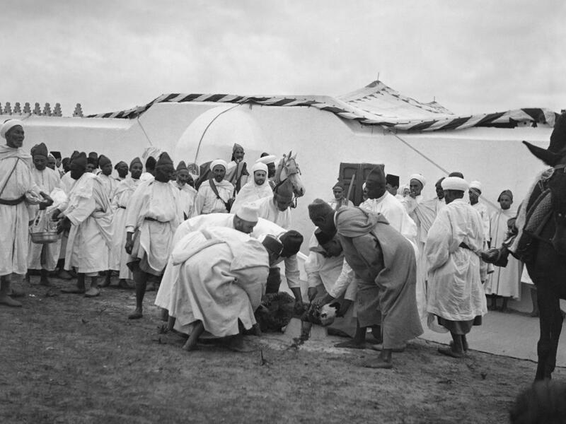 Muslim worshipers slaughter a sheep for the celebrations of the Eid-al-Adha, in November 1945 in Agadir, Morocco. AFP