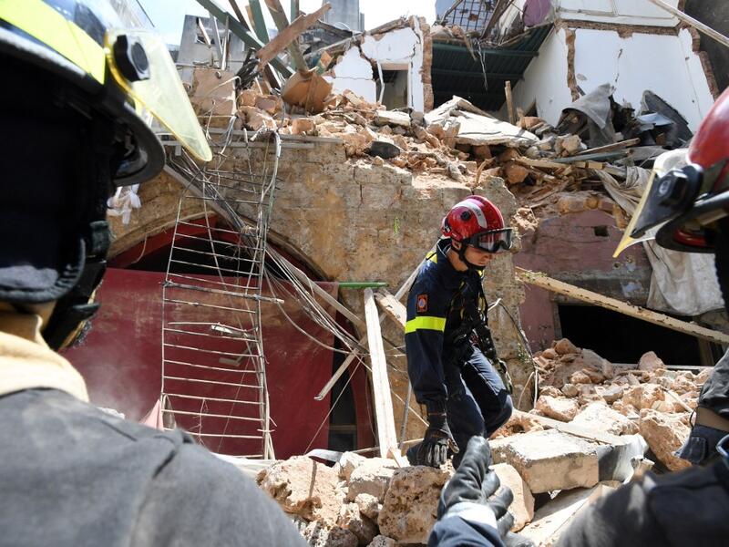 A French rescuer stands amidst the rubble of a building in the Gemayzeh neighbourhood on August 6, 2020, two days after a massive explosion in the Beirut port shook the capital. The blast caused massive destruction and killed at least 113 people, heaping misery on a country in crisis. AFP