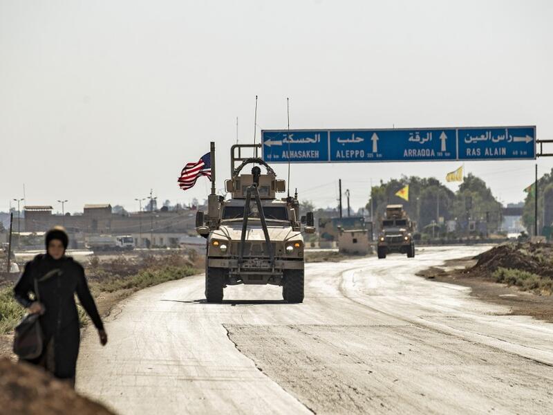 US forces patrol the area of the town of Tal Tamr, in Syria's northeastern Hasakeh province, on August 17, 2020. DELIL SOULEIMAN / AFP